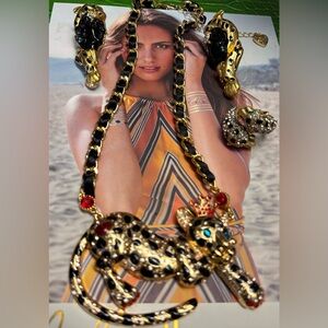 Betsey Johnson necklace, leopard ring, and Fanstar earrings